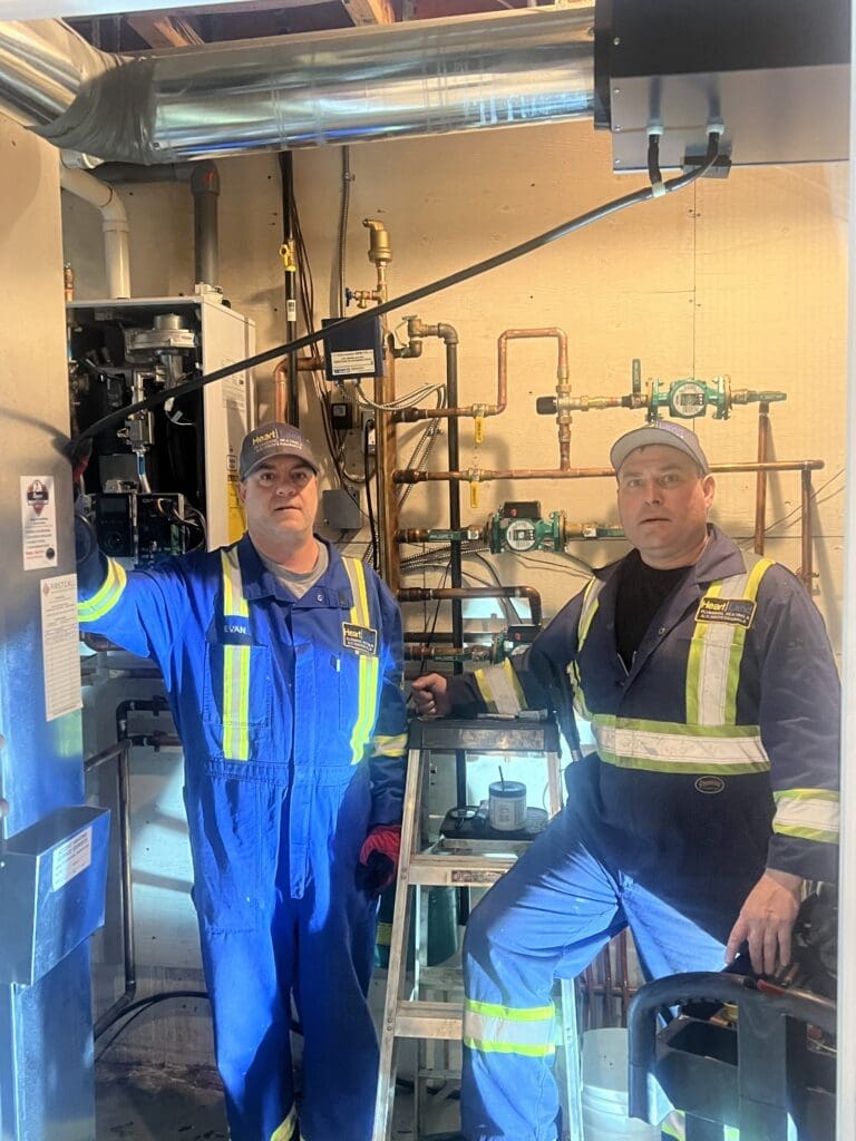 heartland-plumbing-and-heating-ltd-team-working-sherwood-park-ab heartland plumbing and heating ltd team workin in sherwood park ab
