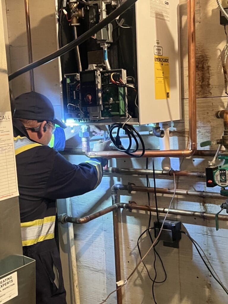 heartland-plumbing-heating-navien-boiler-replacement-16 high efficiency gas boiler in progress installation Edmonton AB