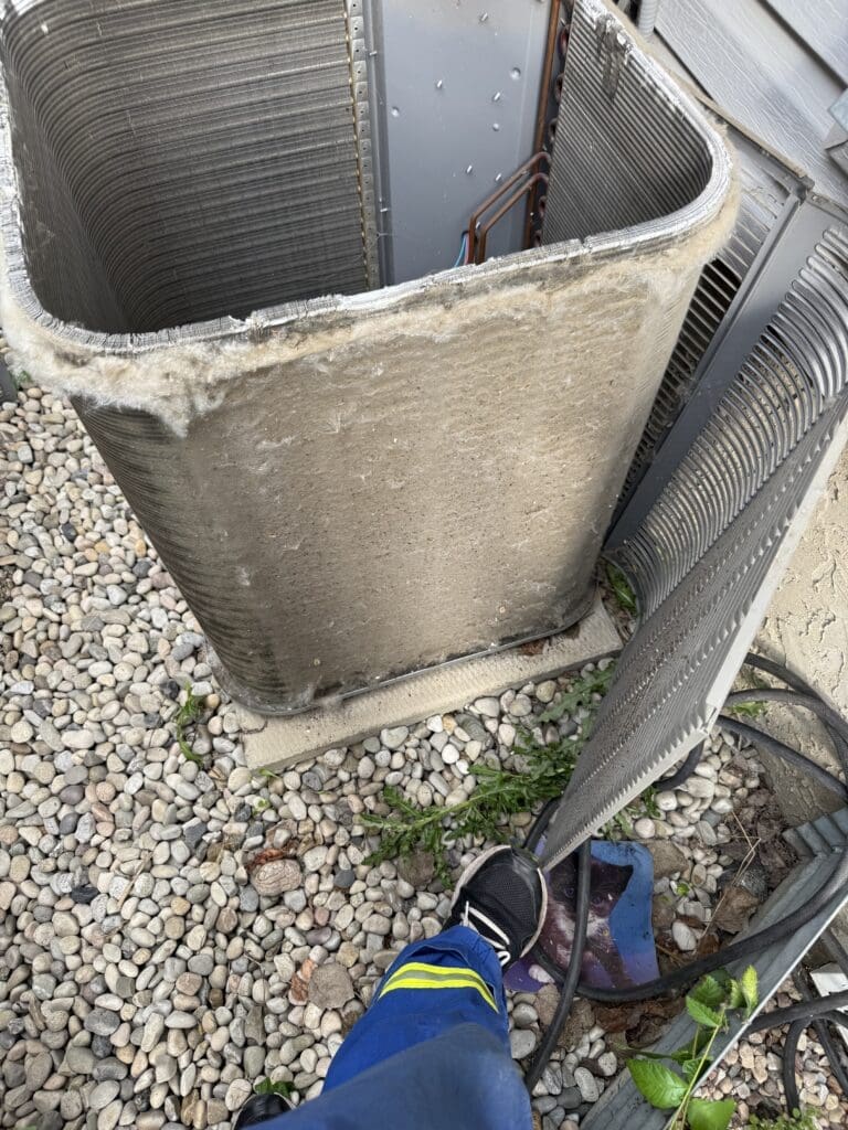 heartland-plumbing-heating-plugged-condenser-coil-coil-edmonton
